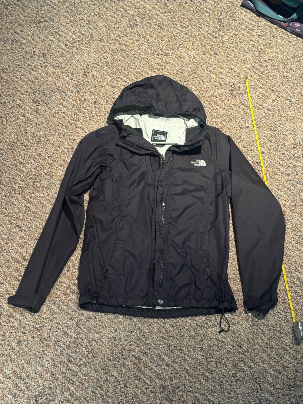 The North Face Black Hooded Rain Jacket, well loved! Size Small, Unisex.